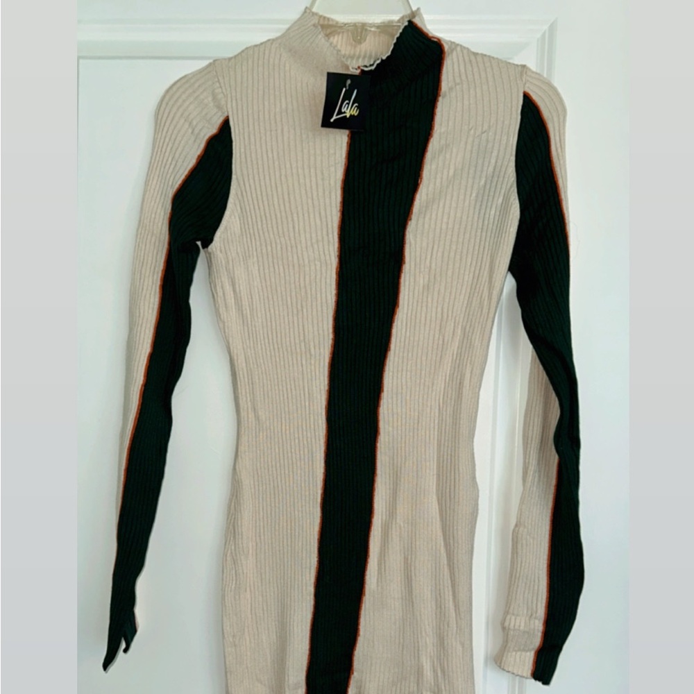 Dressed in LaLa Ivory and Hunter Green Ribbed Dress